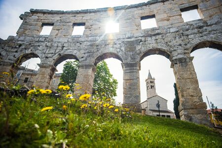 Ancient Roman Amphitheater in Pula, Croatia. Famous tourist destinationの写真素材