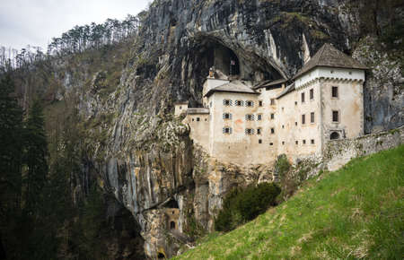 Predjama Castle, situated in the middle of a cliff near Postojna Cave, is the largest cave castle in the worldのeditorial素材