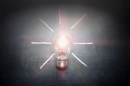light bulb on blackboard idea concept - backgroundの写真素材