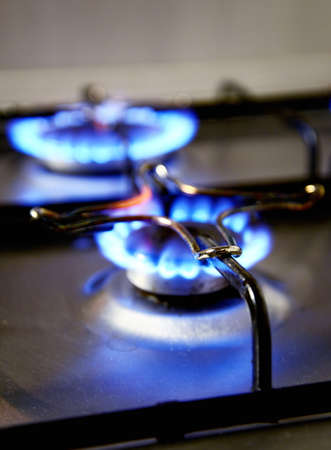 blue flames from gas stove