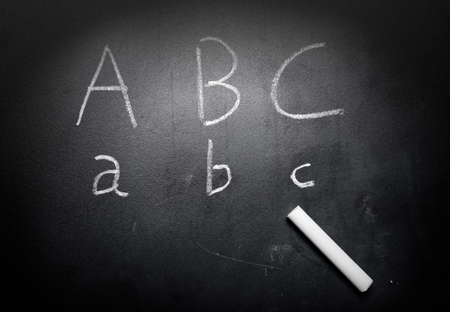 Education concept ABC alphabet on blackboardの写真素材