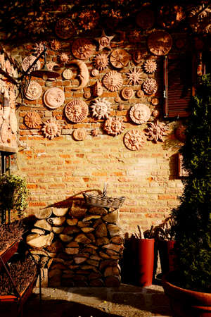 handmade collection of terracotta sun decorationの写真素材