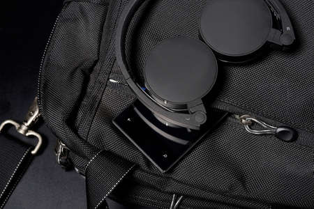 modern travel accessories with headphone and smartphone