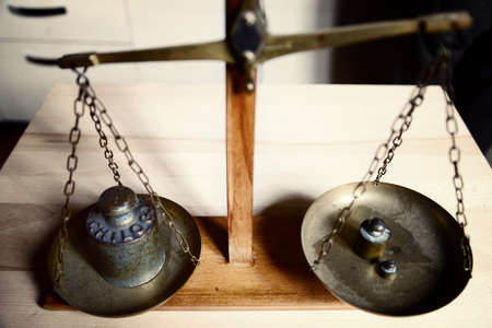 vintage balance with retro weight scale -one kilogram weightの写真素材