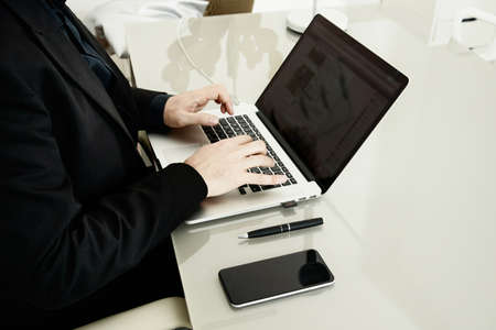 working at home on a clean desk