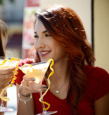 happy Woman  with glasses with cocktailsの写真素材