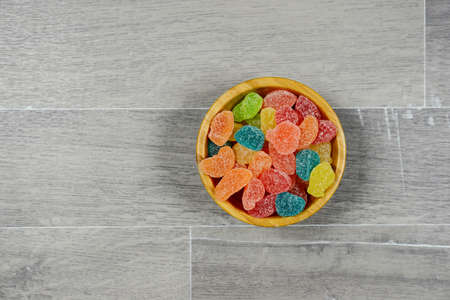 Gummy Bear Candy Colorful Background on wood