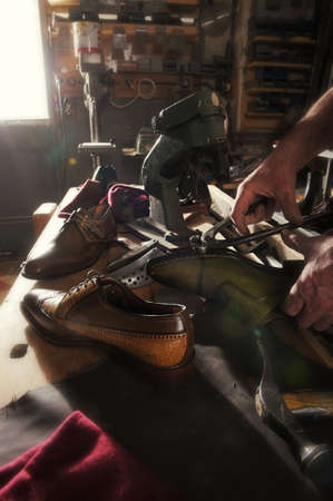 craftsman making luxury handmade man shoes