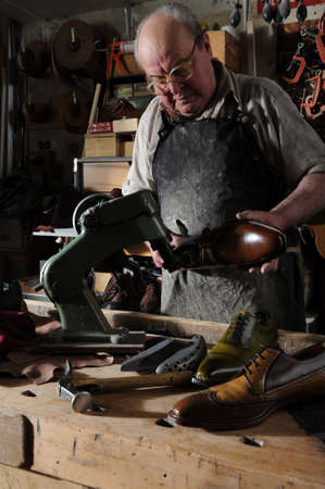 craftsman making luxury handmade man shoes