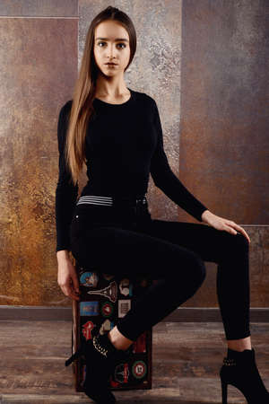 beautiful young woman in fashion outfitの写真素材