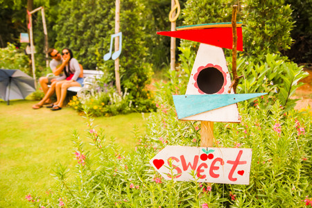 sweet lover on chair in the gardenのeditorial素材