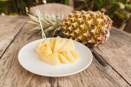 fresh pine apple for healthy on wood tableの写真素材