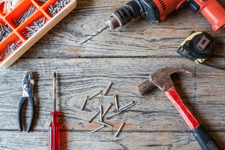 renovation tool on wood background