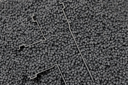 Plastic fitting for waste water with raw material
