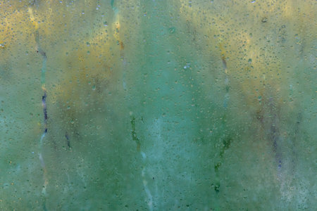 abstract background of water drops on the surface of a window glassl