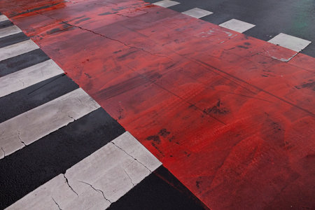 Red and white zebra crossing on the road. Abstract background.の写真素材