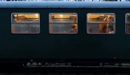 Train in motion. Railway station in winter.