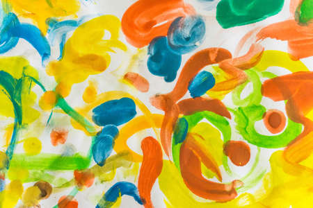 Grunge akvarel splatter paint background, yellow, red, orange, green, chartreuse, blue, finger painting, abstract color textureの写真素材