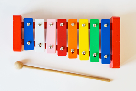 Top view of toy colorful xylophone, on the white table.の写真素材