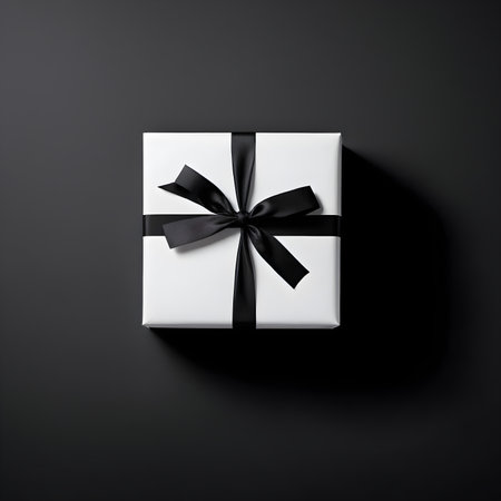 White gift box with black bow on black background. 3d renderingの素材