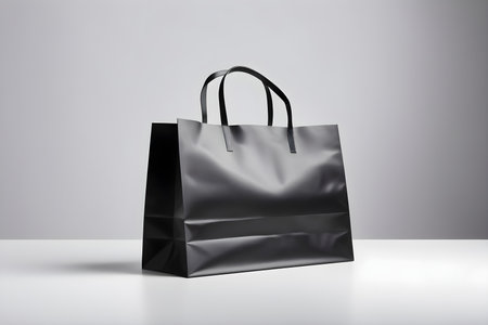 Black paper shopping bag on white background. 3d rendering mock upの素材