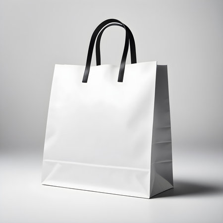 Blank paper shopping bag mockup isolated on white background 3D renderingの素材