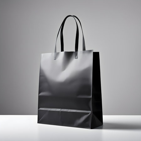 Black paper bag isolated on gray background. 3d rendering. Mock upの素材