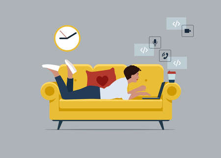 Young businessman character lying on the sofa and typing on a laptop, working from home concept.のイラスト素材