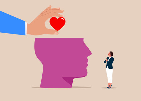 Hand put positive heart shape into human brain. Emotional intelligence ability to understand emotions and balance between heart and brain, reason and emotion.のイラスト素材