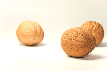 many nuts isolated on whiteの写真素材