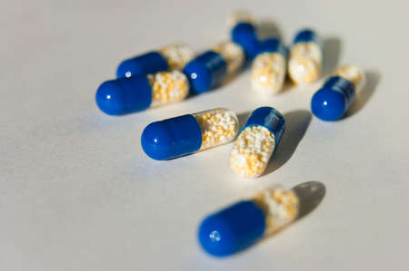 many capsules isolated on backgroundの写真素材