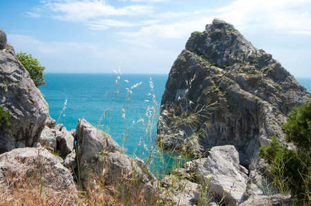 rock and beach in Simeizの写真素材