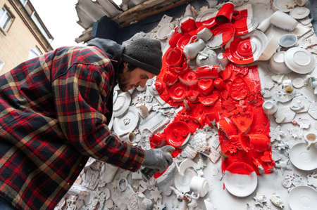 December 18, 2021. Rostov-on-Don. Russia. Human graffiti artist writer working on painting