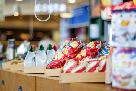 Shelf with snacks in cafeの写真素材