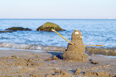 Ugly sandy snowmanの写真素材
