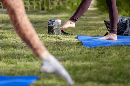 Morning stretching in garden 2の写真素材
