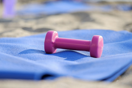 Dumbbell on yoga matの写真素材