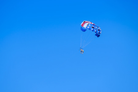 People are parachuting in the skyの写真素材