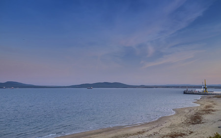 Sunset over sandy beachの写真素材