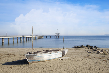 An old boat on a sandy beachの写真素材
