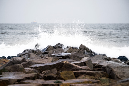 Storm on the winter stone beach