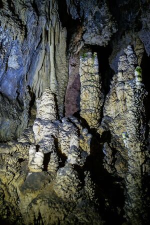Passages covered with old stalactites and stalagmites inside the cave 5の写真素材
