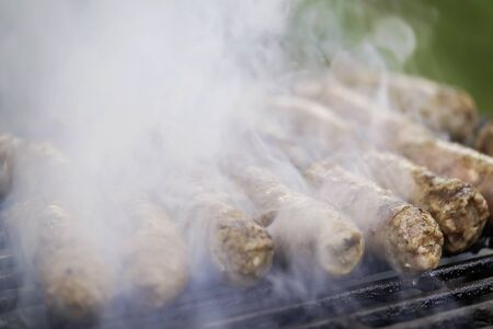 Grilled Sausages Are Fried in Smoke BBQの写真素材