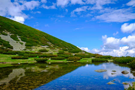 Landscape of Clear Mountains Lake with Reflectionsの写真素材