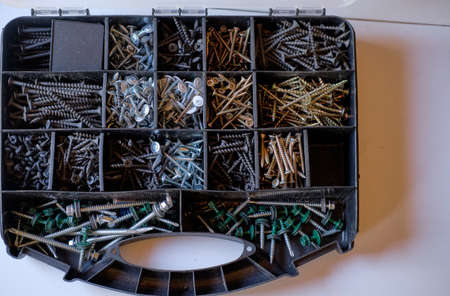 container with iron nails. Tool case. Men's territory. Worker's workshop. Various iron nails