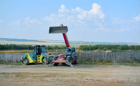 tractor in field. harvesting in the field. agriculture in summer