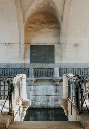 old stone staircase. river channel. Under the stone bridge. Neva river channelの写真素材