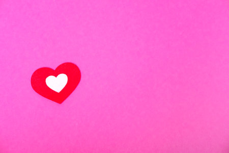 heart on a pink background for a greeting card or banner for Valentine's Day, copy spaceの写真素材