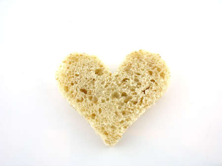      Heart made of fresh, tasty bread.                          の写真素材