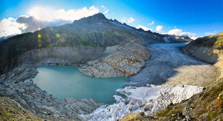fantastic view of the great rhone glacier and the mountains in the canton of valais. Eternal ice near the Furka Passの写真素材